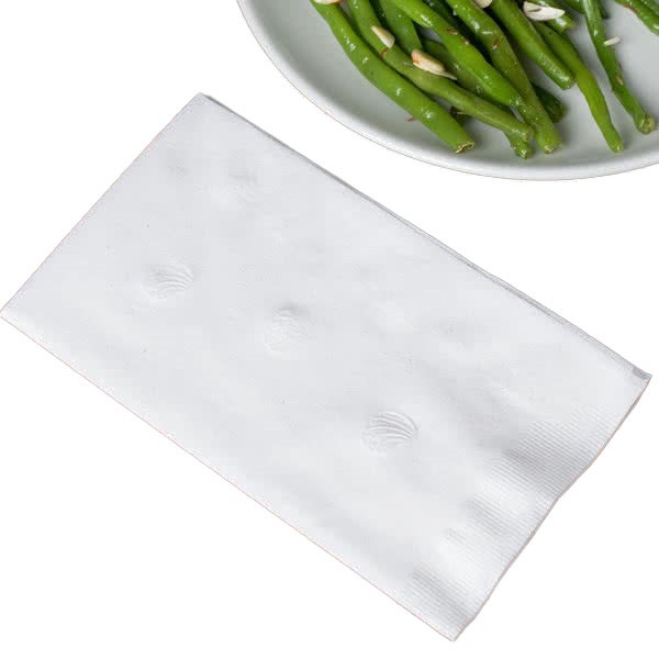 White folded dinner napkin